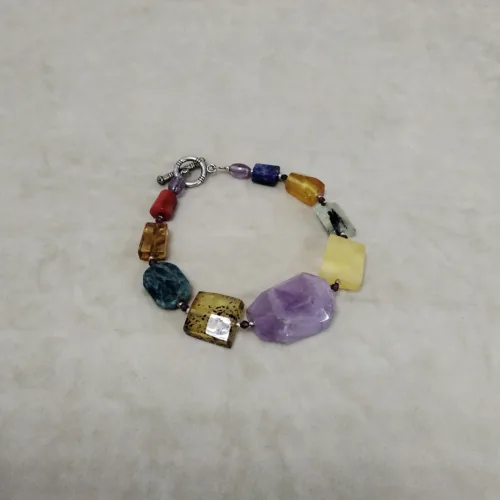 Natūralaus Baltijos gintaro apyrankė „Tamsos ir šviesos žaismas“